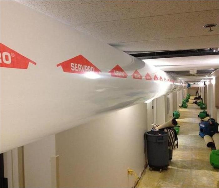 storm damaged commercial hallway