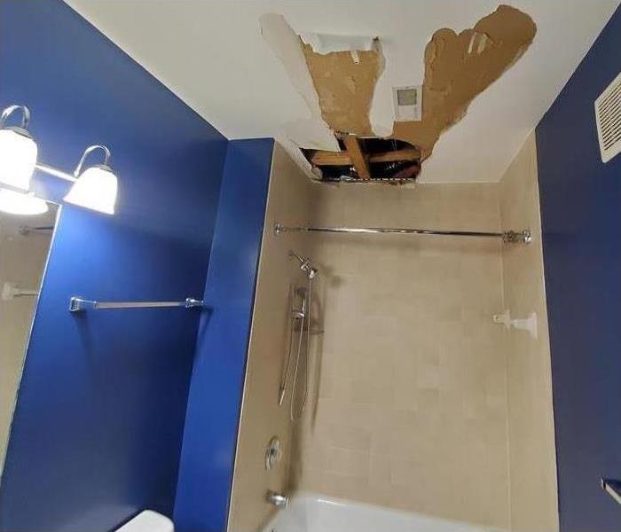 water damaged shower roof